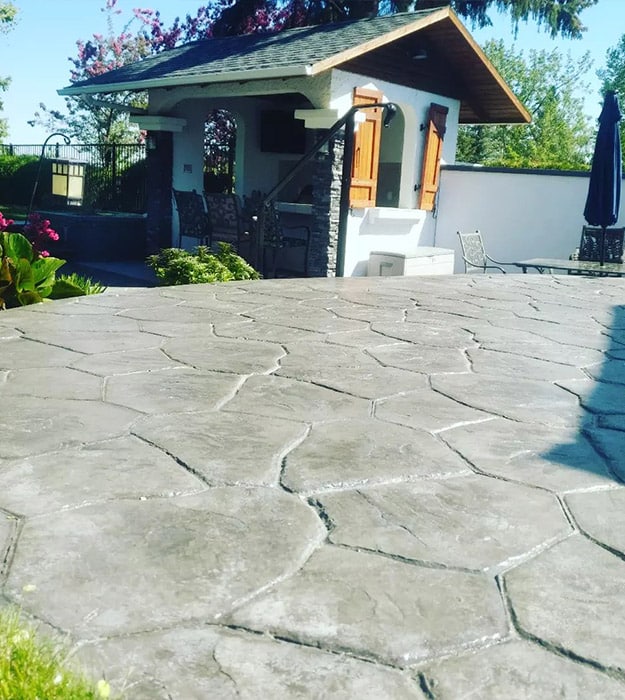 Stamped concrete patio in an Edmonton backyard